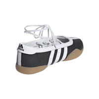 Adidas Chaussure Taekwondo Mei Black White sneakers on feet Dubai
