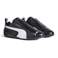 Balenciaga x Puma Speedcat Leather White Black sneakers on feet Dubai