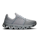 Gray running shoe with unique sole design on a white background