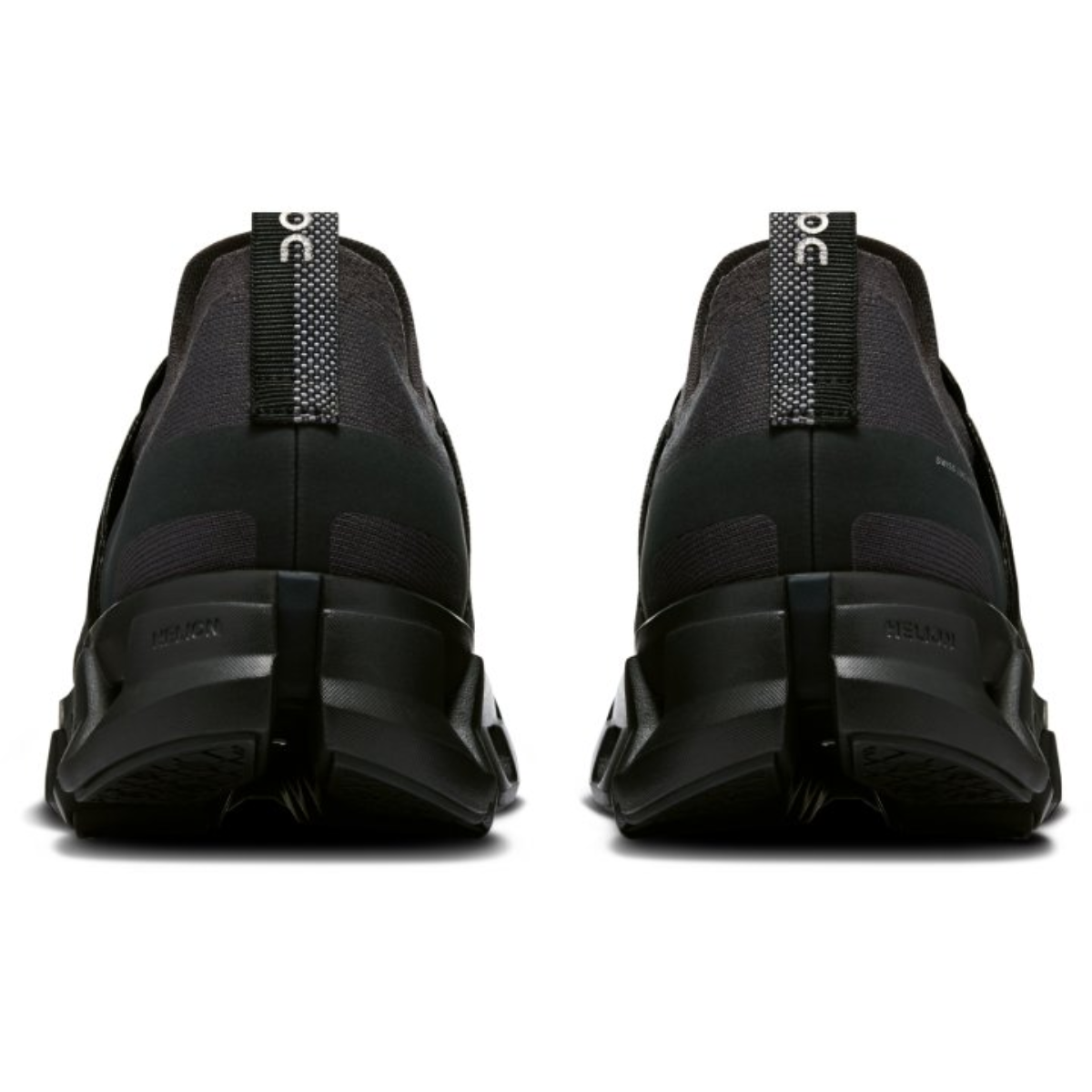 Black slip-on shoes with brand logo on a white background