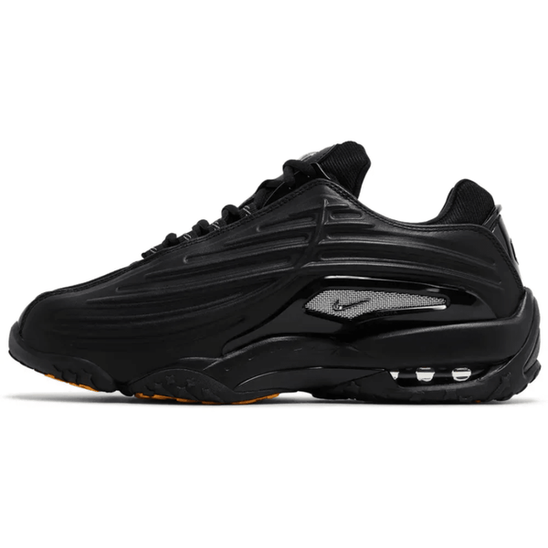 Nike NOCTA x Hot Step 2 Black sneakers on feet Dubai
