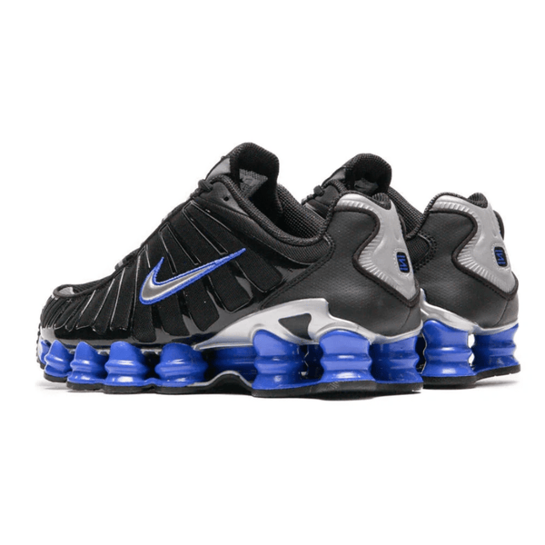 Nike Shox TL Black Racer Blue sneakers on feet Dubai