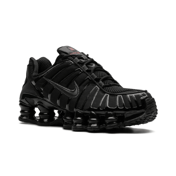 Nike Shox TL Black Max Orange sneakers on feet Dubai