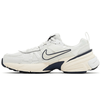 Nike V2K Run Platinum Tint Guava Ice sneakers on feet Dubai