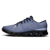 On Cloud X 4 Feather Black on feet Dubai