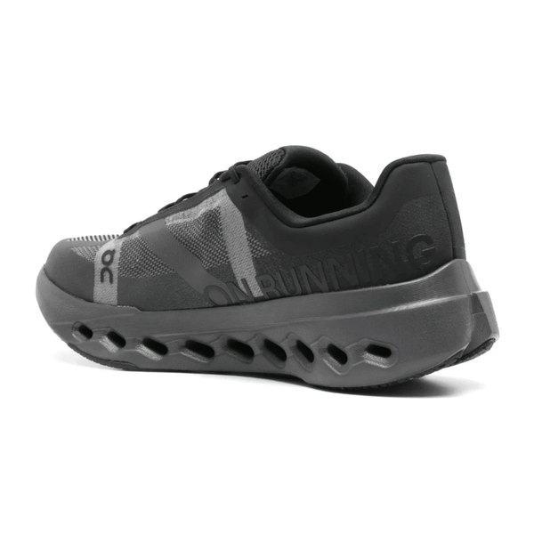 On Cloudsurfer Next Black on feet Dubai