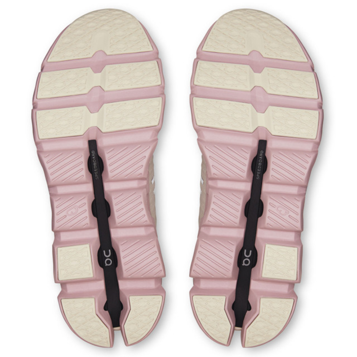 Pair of pink sandals with white soles on a white background