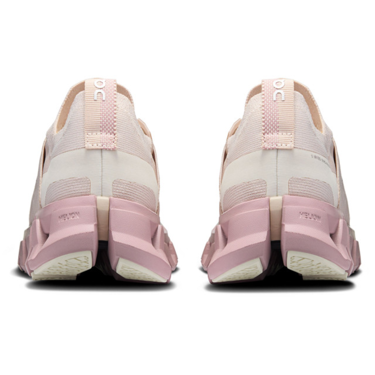 Pink and white running shoes shown from the back on a white background