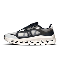 Front view of black and ivory On Cloudtilt Remix shoes