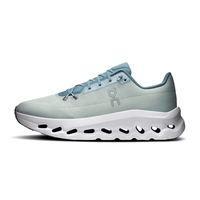 Front view of blue and white On Cloudtilt men’s shoes