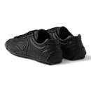 Prada Montecarlo Re-edition 2005 Antiqued Nappa Leather Sneakers Black on feet Dubai