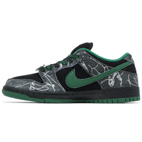 THERE Skateboards x Dunk Low SB Ultra Humanized Special Box sneakers on feet Dubai