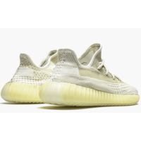 Yeezy Boost 350 V2 Natural sneakers on feet Dubai