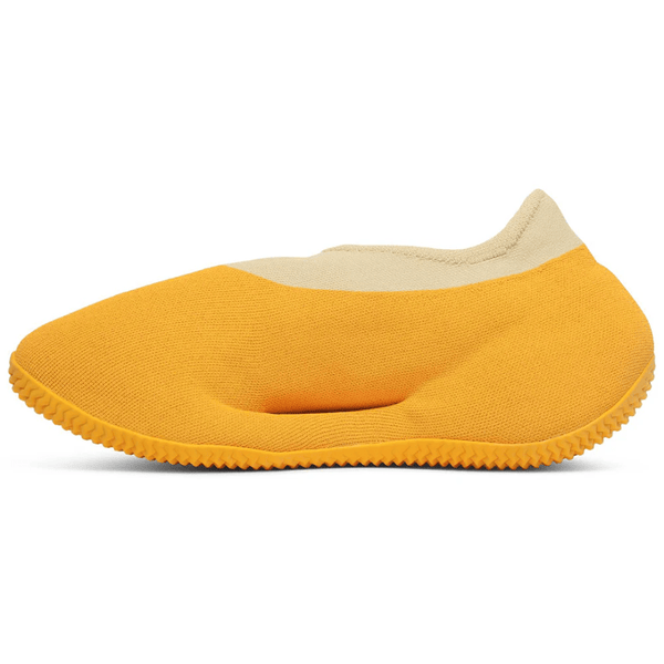 Yeezy Knit Runner Sulfur sneakers on feet Dubai